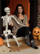 Halloween Booze Socks by Warrior Alpaca on woman with skeleton.