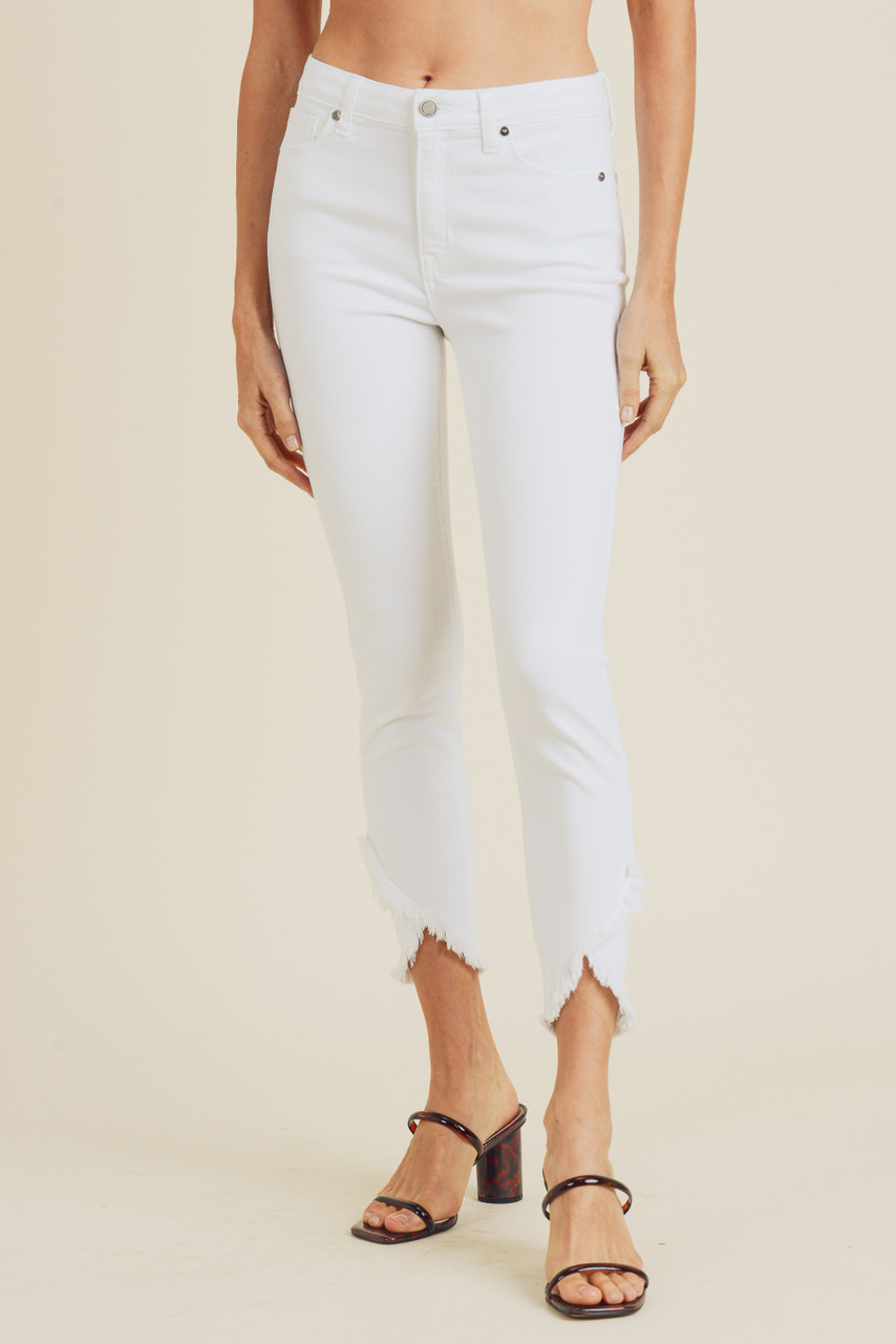 white skinny jeans with frayed hem