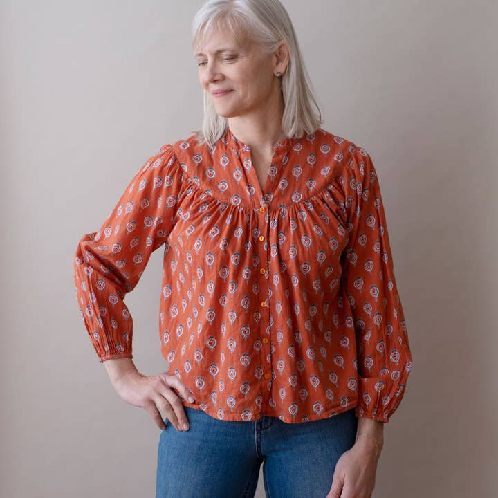 burnt orange polka dot top
