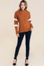 burnt orange sweater