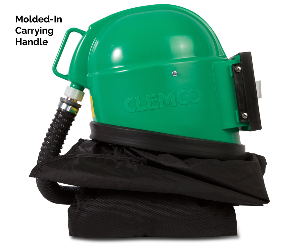 a green helmet with a black cape