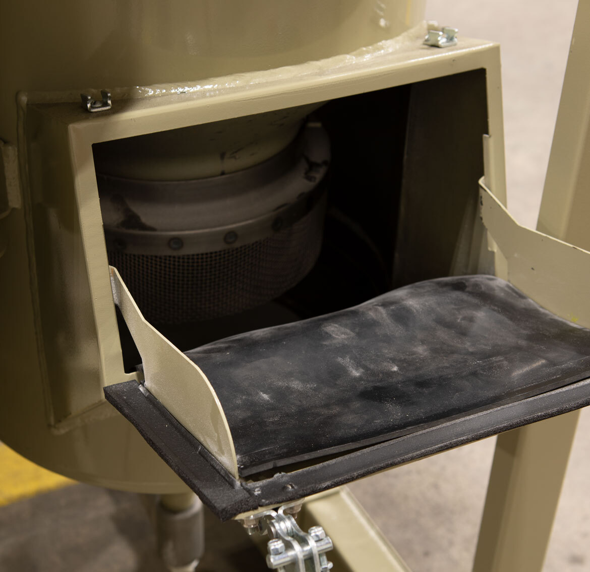 Open chute looking into machine