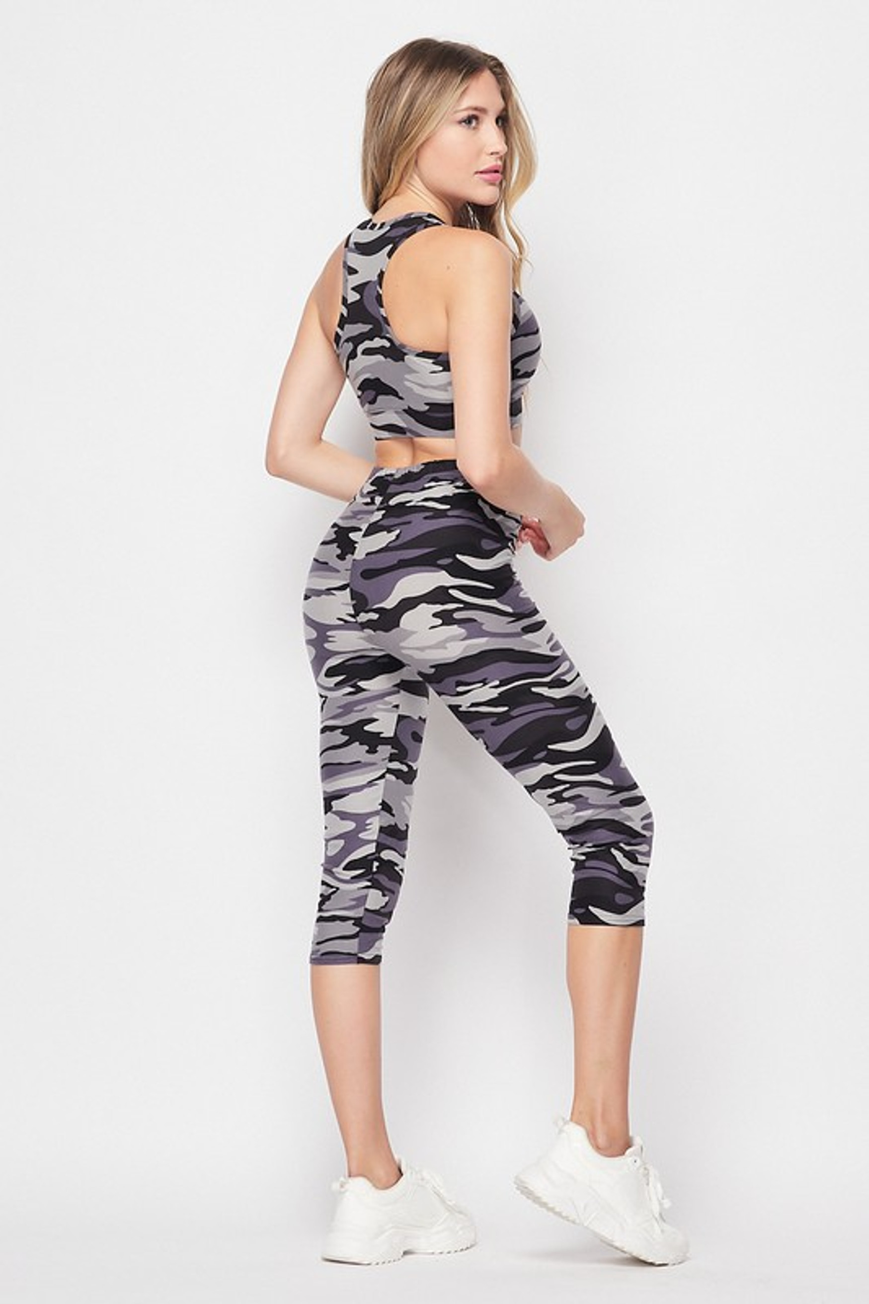 45 degree back right side view of 2 Piece Charcoal Camouflage Crop Top and Capris Set with an all over olive army print design.