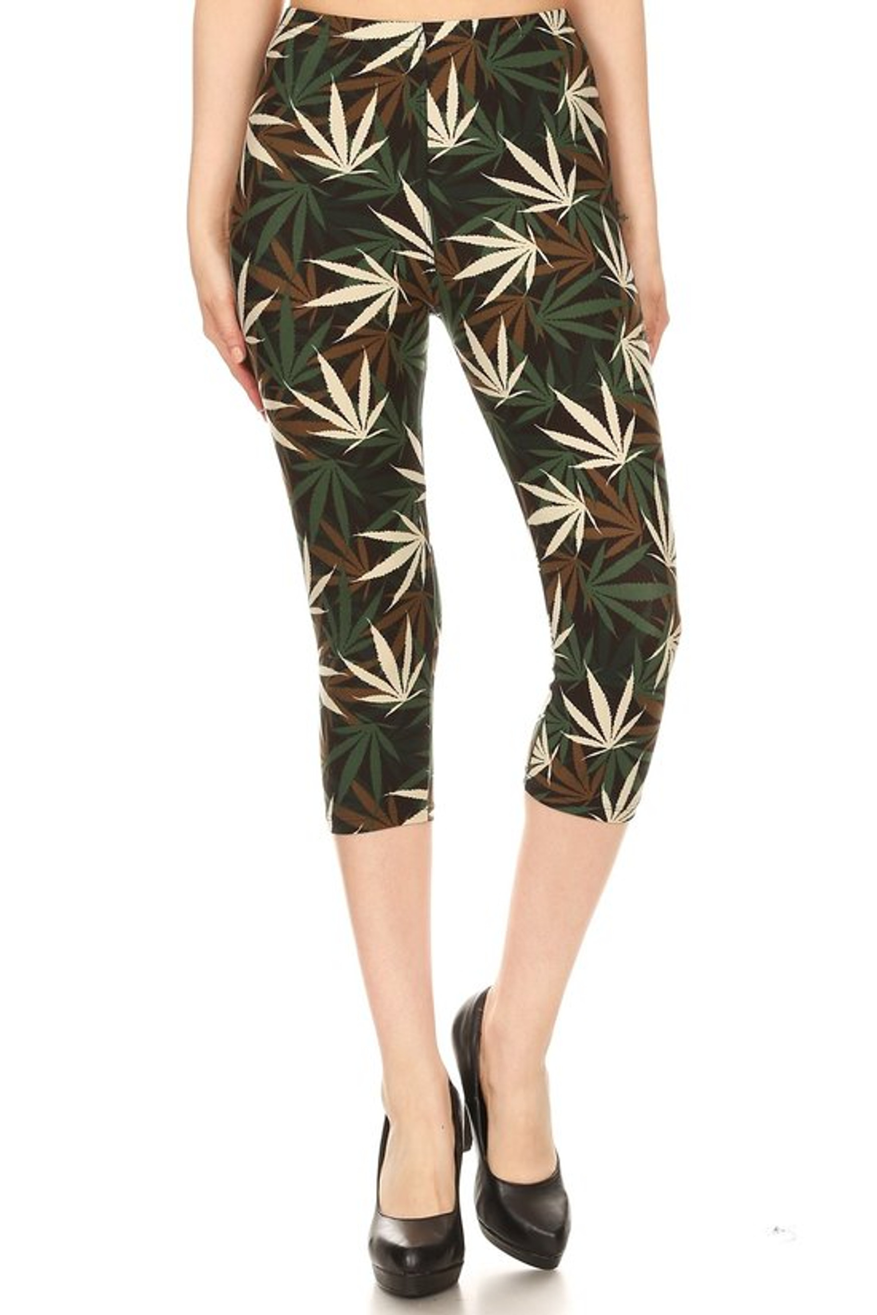 These are our Buttery Soft Earthen Marijuana Capris featuring a camouflage inspired color scheme of olive, ivory, and brown toned pot leaf print contrasting a black background.