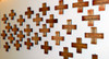 close-up of memorial crosses on wall of remembrance