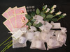 Supplemental package can be added to the Infant Loss Memorial Mass Comprehensive package for additional white rosebuds, white votive candles, pocket tokens and greeting cards for each attendee. 