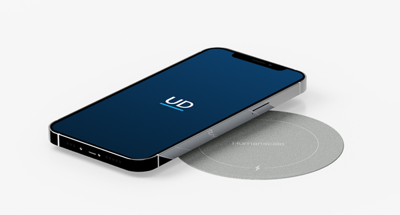 NeatCharge is a sleek and efficient wireless charger that lets you effortlessly charge your devices—simply by placing them on the table