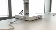 Docking Station is rear-mounted and allows for easy plugging and unplugging of cords and cables
