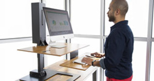 The E7 Electric Standing Desk Converter: Customizable, Adaptable, and Now Available for Pre-Order!