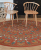 Biltmore Spicher Biltmore Arabesque Bloom Vermillion Slate - round vinyl floor cloth in a setting 