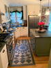 Pura Vida customer use of We're all mad here vinyl floor cloth used in a kitchen 