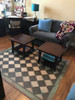 Classic Pattern 9 Checkmate - vinyl floor cloth used in a living room