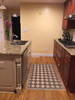 Classic Pattern 9 Checkmate - vinyl floor cloth used in a kitchen 