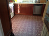 Classic Pattern 21 The Red Queen - vinyl floor cloth used wall to wall in a kitchen 