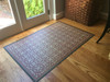 Classic Pattern 21 The Red Queen - vinyl floor cloth used as an entry mat