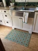 Pattern 33 I Am Not a Bumblebee - vinyl floor cloth used in a kitchen