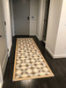 Pattern 25 Gustav - vinyl floor cloth Pura Vida customer use in a hallway