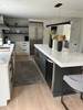 The Legacy In the Track of the Book Worm - vinyl floor cloth as used in a kitchen.