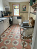 Pattern 78 Wake up Little Susie - vinyl floor cloth wall to wall customer application in a kitchen