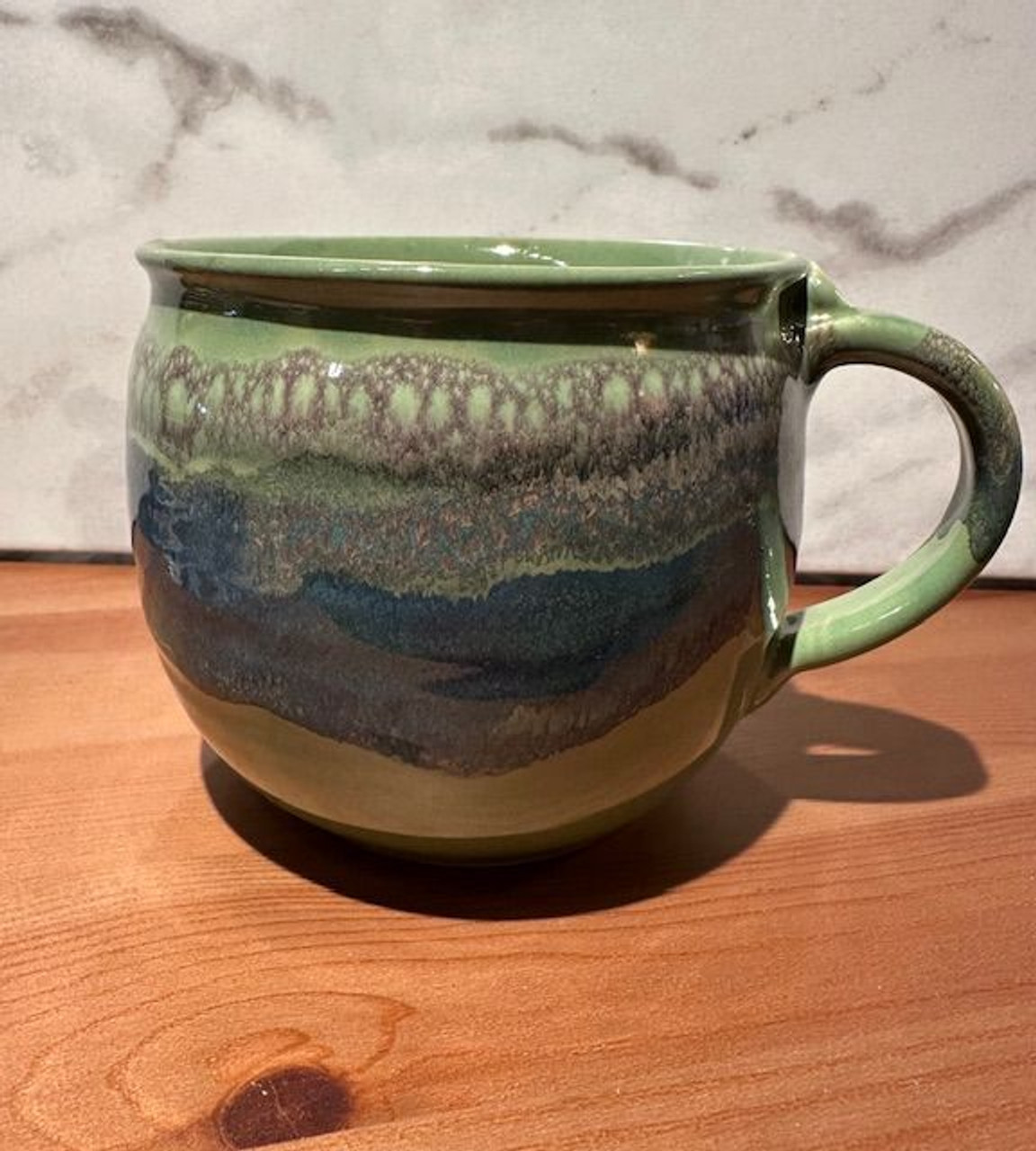 misty green latte mug clay in motion