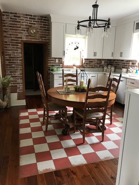 Classic Pattern 7 Checked Out (distressed)- vinyl floor cloth used in a dining room