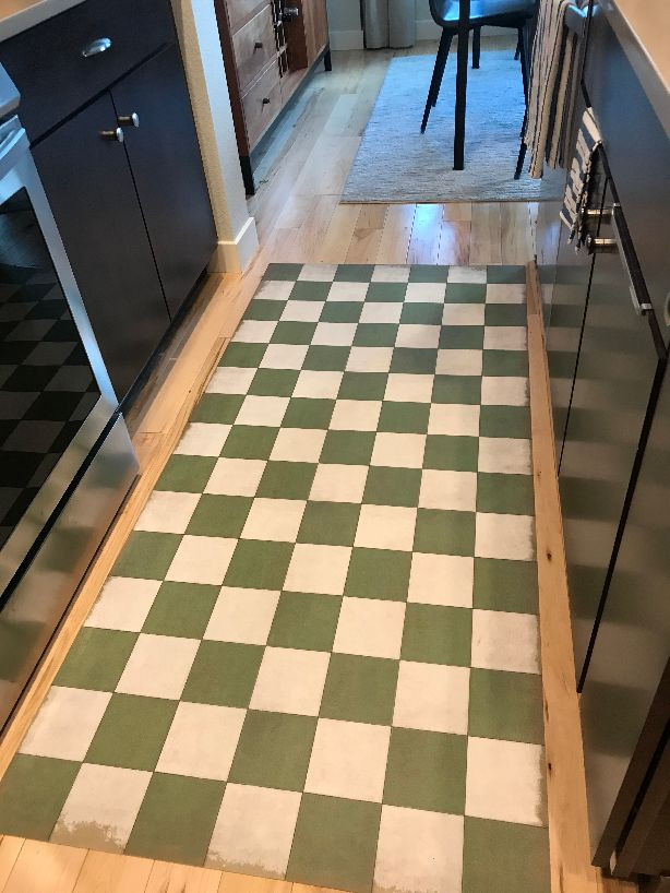 Classic Pattern 7 Check Please (distressed)- vinyl floor cloth runner used in a kitchen 