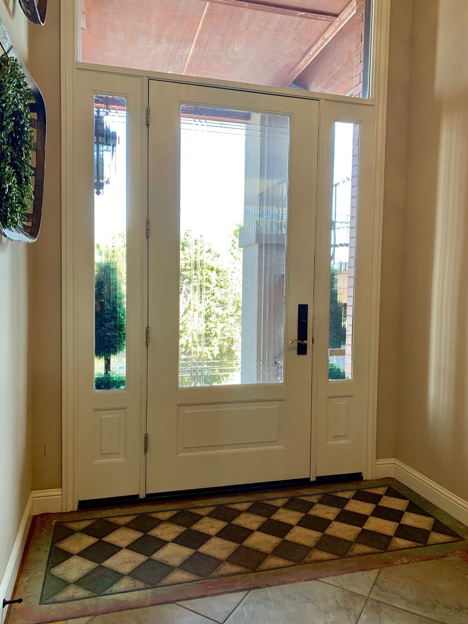 Classic Pattern 9 Checkmate - vinyl floor cloth used in an enrtyway