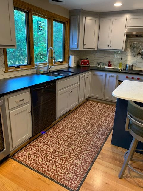 Classic Pattern 21 The Red Queen - vinyl floor cloth used in a kitchen 