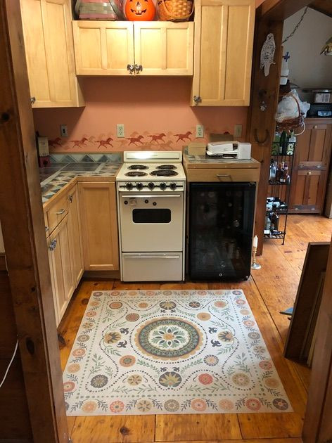 Pattern 38 Autumn - vinyl floor cloth 48x48 used in a kitchen 