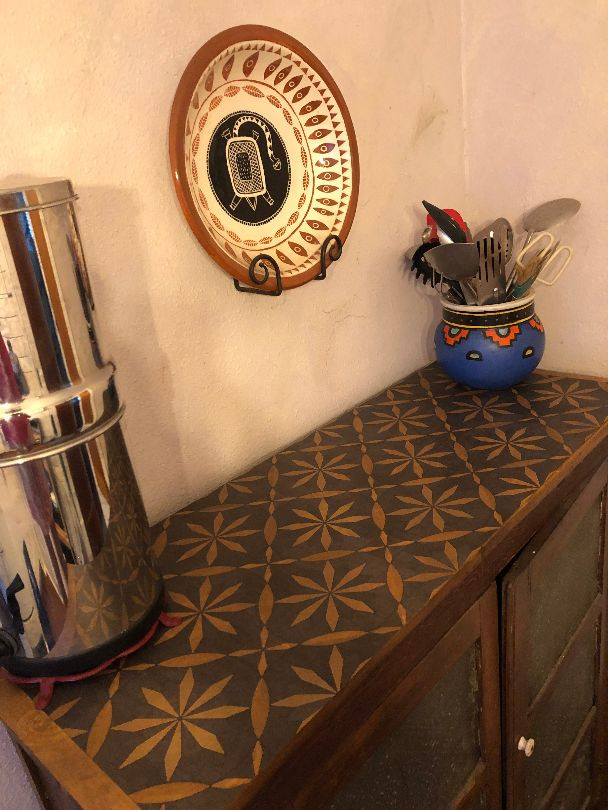 Roycrofter No Enemy but Himself - vinyl floor cloth used as a tabletop protector