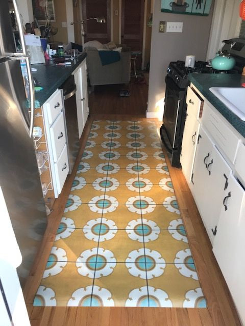 Pura Vida customer use of Happy Days vinyl floor cloth in a kitchen