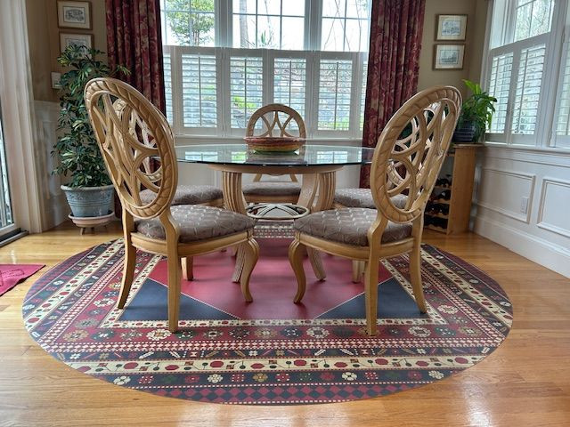 Lombalo Ashkar - vinyl floor cloth  customer use of a custom round size 108" (made from square image)