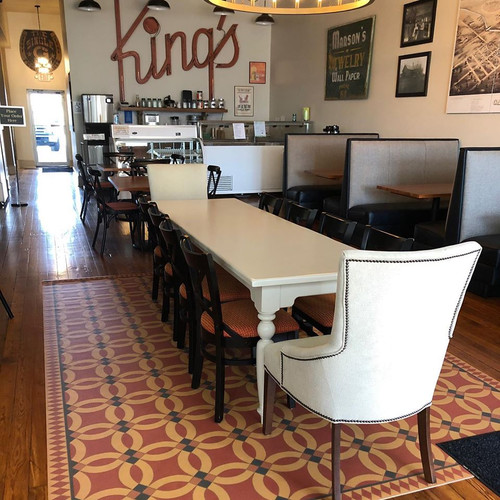 Pura Vida customer use of Persephone vinyl floor cloth in Kings Cafe. 