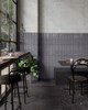 Black Station Tiled Wall Room Scene