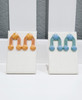 Aniyan orange and blue medium 3D printed statement earrings by brand zuri perle