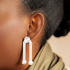 Aniyan symbol 3D printed light weight statement earrings by dallas based brand zuri perle