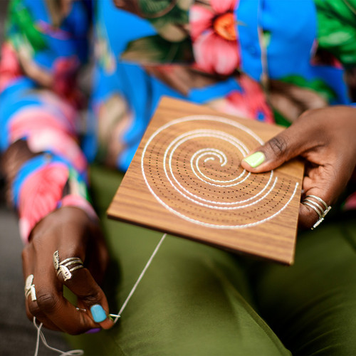 black woman hand embroidering wood igba aye contemporary art home decor by Zuri Perle black woman hand embroidering wood igba aye contemporary art home decor by Zuri Perle