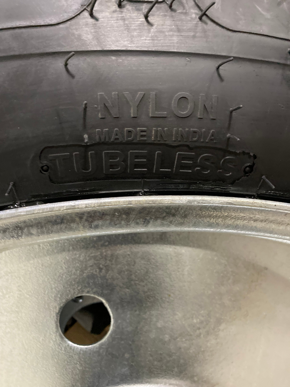 11.2 38 MRL R-1 Tractor Tread 10 Ply Assembly Tire Mounted on a Rim 