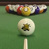 Wichita State Shockers cue ball positioned on green pool table felt in front of a racked set of billiard balls, featuring the WuShock mascot logo with a pool cue lined up for the break.