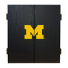 Closed University of Michigan Wolverines dart cabinet in black with the maize Block M logo displayed on the front doors.