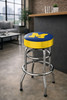 Michigan Wolverines 30" chrome bar stool displayed in a home entertainment setting, featuring a blue and maize team logo seat with a polished chrome base. This college team stool is perfect for adding Michigan spirit to a fan cave, home bar, pool room, or game room.