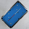 Arizona Wildcats 19oz Team Color Laser Etched 58" Cue displayed diagonally across a blue-felt pool table, demonstrating its full playing length and Wildcats game-room appearance.