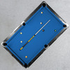 Missouri Tigers 19oz Team Color Laser Etched 58" Cue displayed diagonally across a blue-felt pool table, demonstrating its full playing length and Tigers game-room appearance.
