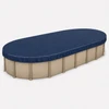 18' x 33' oval above-ground swimming pool with navy blue winter pool cover installed for seasonal protection from leaves, debris, precipitation, and winter weather.