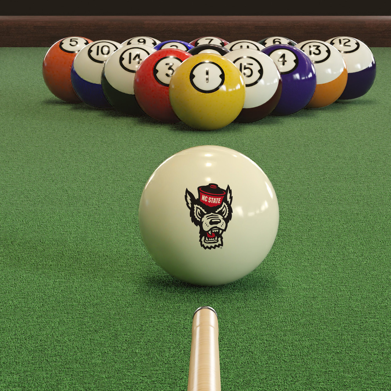 North Carolina State Wolfpack cue ball positioned on green pool table felt in front of a racked set of billiard balls, featuring the NC State Wolfpack mascot logo with a pool cue lined up for the break.