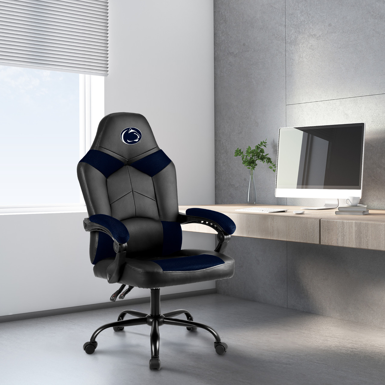 Penn State Nittany Lions oversized blue and black gaming chair shown in a home office setting