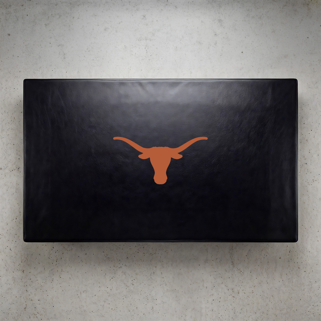 Texas Longhorns pool table cover shown from above, featuring a black cover design with the burnt orange Longhorns logo centered on the surface. This NCAA billiard table cover is designed to protect the table while showcasing University of Texas team pride.