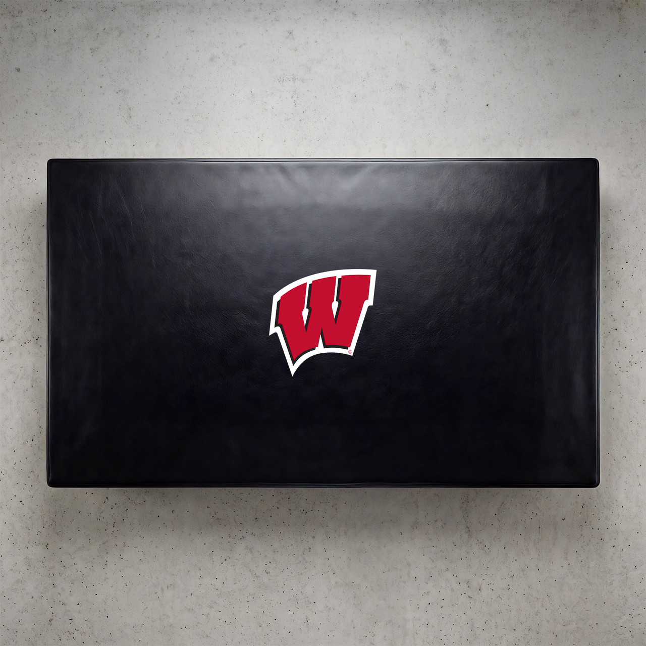 Wisconsin Badgers pool table cover shown from above, featuring a black cover design with the red Wisconsin “W” logo centered on the surface. This NCAA billiard table cover is designed to protect the table while showcasing University of Wisconsin team pride.