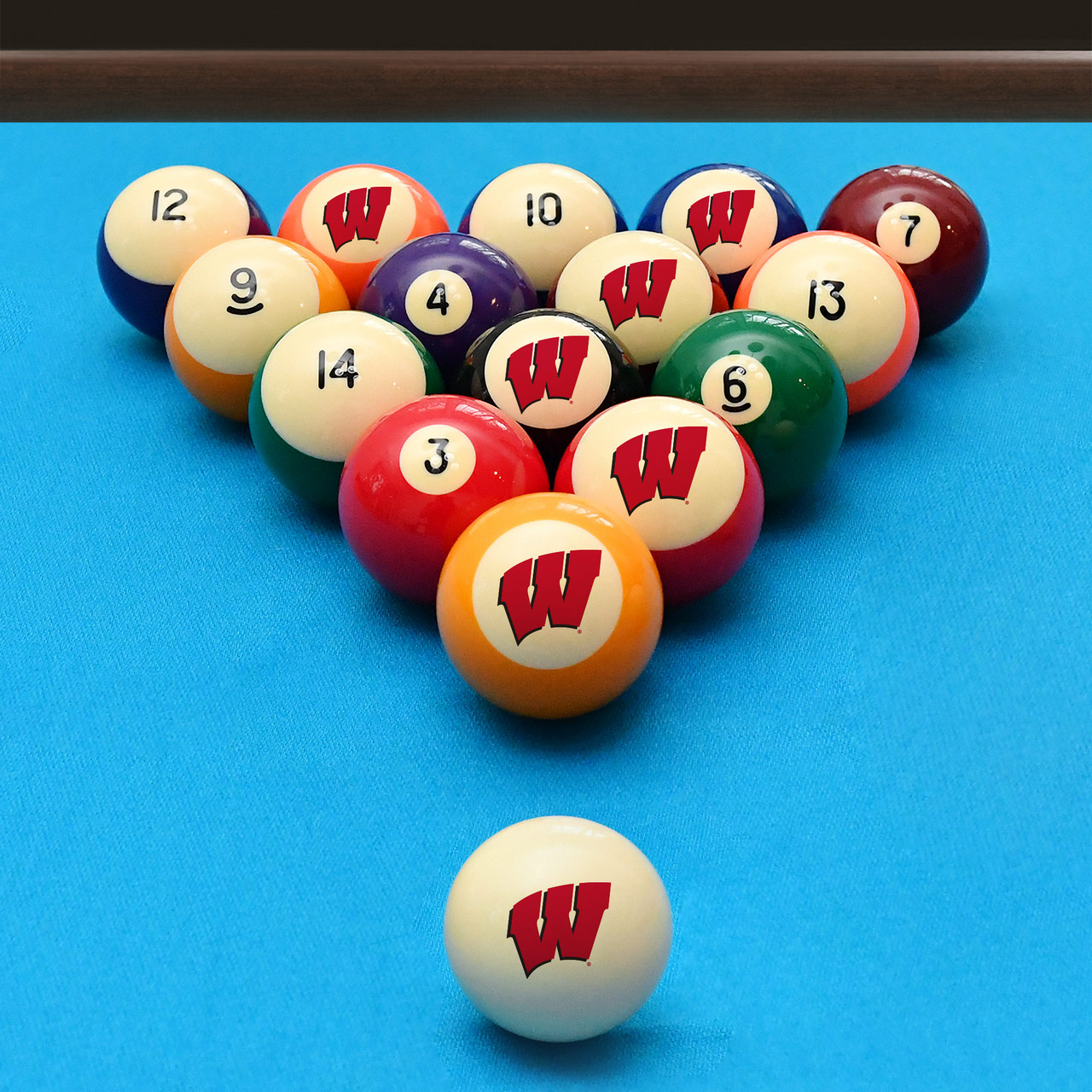Wisconsin Badgers billiard balls arranged in a triangle rack on blue pool table felt, featuring red Motion “W” graphics with a coordinating Wisconsin cue ball positioned in the foreground.