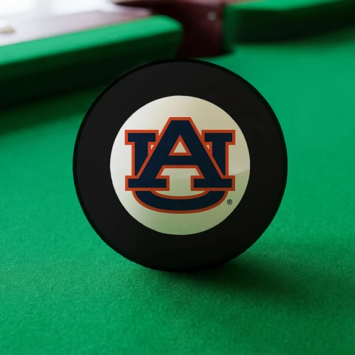 Auburn Tigers Eight Ball displayed on green pool table felt, featuring the navy blue and orange interlocking AU logo inside the white center circle of a classic black billiard Eight Ball.